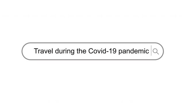 Travel during the Covid-19 pandemic typed in a search bar of a search engine. Sliding text on a search box with a white background.