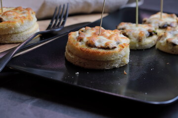 A platter of Cheesy Mushroom croustades or Cheesy Mushroom Discs