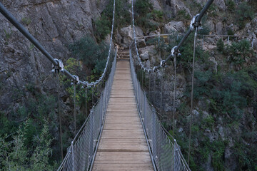 Fototapeta na wymiar suspension bridge on the route of a thousand bridges