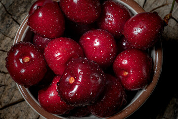 Large ripe berries cherries, wet from water. Healthy berry close-up