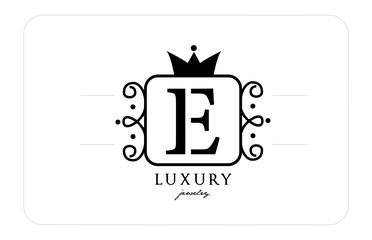 E simple monogram alphabet letter logo in black and white. Creative icon design with king crown for luxury company and business