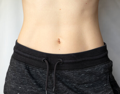 Sexy Flat Belly Of A Woman Stock Photo, Picture and Royalty Free Image.  Image 10931738.