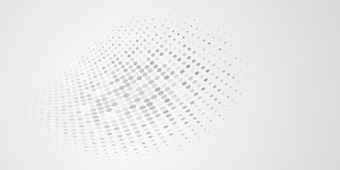 Abstract background made of halftone dots in white and gray colors