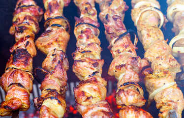 Shish kebab of meat skewered on a grill