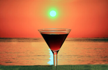 a glass of wine by the sea