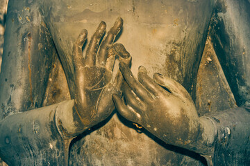 Phayao, Thailand - Dec 6, 2020: Front Hand of Buddha Statue on Center Frame in Wat Analayo Temple in Vintage Tone