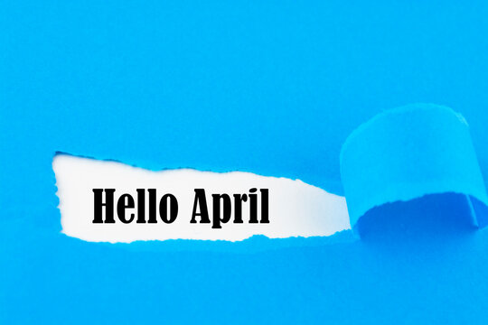 Hello April concept. Inscription in torn envelope