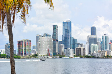 Fototapeta na wymiar Boaters enjoying a day on the water with downtown Miami Beach, Florida in the background