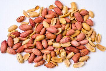 Peanuts with shells on white background