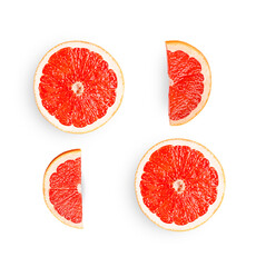 Grapefruit isolated on white background. Four slices of fruits
