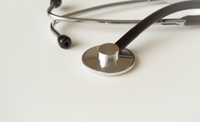 stethoscope on white background close-up, health and medicine concept