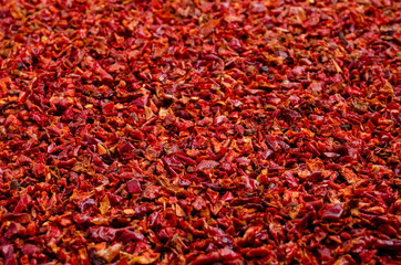 Fototapeta premium Slices of dry red pepper.