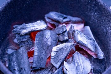 make a fire with charcoal.