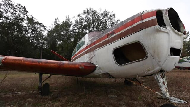 Small Abandoned Plane In Field From Front