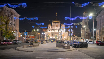 Fototapeta premium Citizens walk along Soborny lane