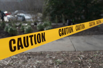 Yellow barricade tape by isolating a working area.