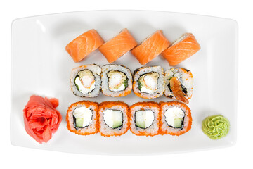 Japan appetizing sushi rolls on a white plate isolated on a white background. Restaurant serving concept.