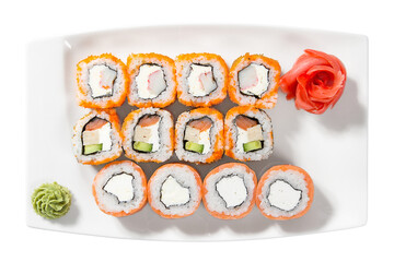 Japan appetizing sushi rolls on a white plate isolated on a white background. Restaurant serving concept.
