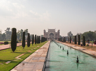 Taj mahal entrance gate at morning from flat angle