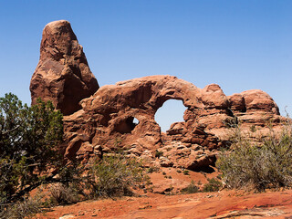 Turret Arch is a distinctive sandstone rock formation found in the desert landscape of Arches National Park near Moab, Utah. © Kenneth Keifer