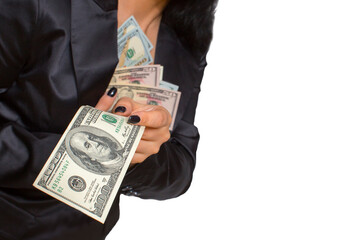 Female hands hold dollar bills.