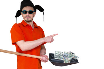 Charismatic man holding dollars on a shovel. The concept of big profits in business.