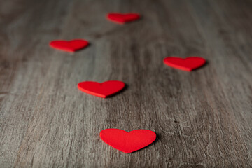 Red hearts on black background