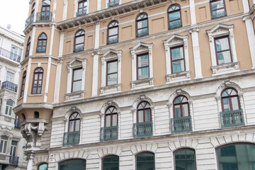 Fototapeta na wymiar Vintage building facade wall. Classic european architecture