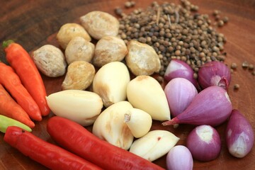vegetables and cooking spices such as chilies, candlenuts, pepper, garlic, shallots 