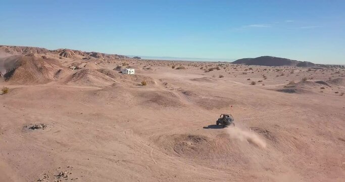 Off-road Vehicle driving in the desert