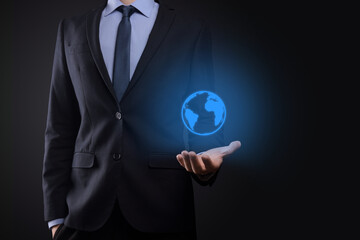 Businessman man hand holding Earth icon , digital globe