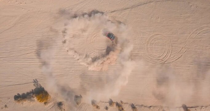 Off-road Vehicle Doing Donuts In The Desert