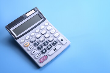 Calculator keypad on a blue background. Top view. Copy space