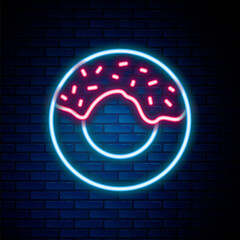 Glowing neon line Donut with sweet glaze icon isolated on brick wall background. Colorful outline concept. Vector.