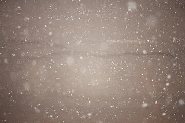 blurred background snowfall nature, abstract falling snowflakes design