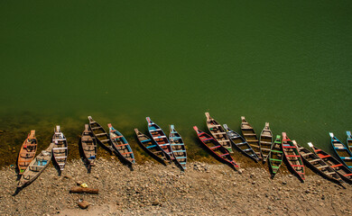 colorful tourist traditional wood boats isolated many at river edge