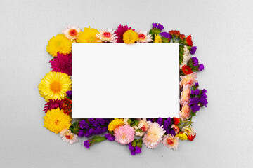 Blank paper with copy space and flower buds