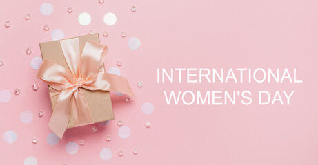 Gifts on pink background, love and valentine concept with text International Womens Day
