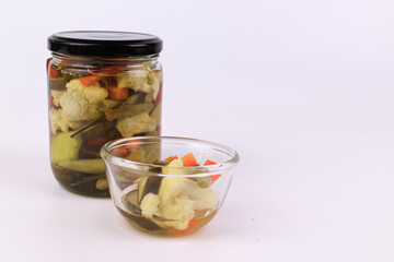 Pickled Vegetable in a bottle on  white background