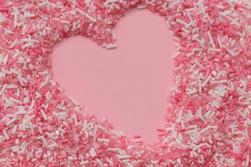Fototapeta premium Valentine's day background. Love concept. Postcard with blank hearts.Pink heart in pink sugar decor. 