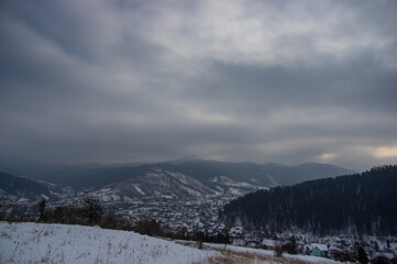 Rural landscape in winter Carpathian mountains