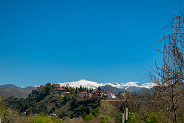 Views of Sierra Nevada with snow from the city of Granada in Spain.