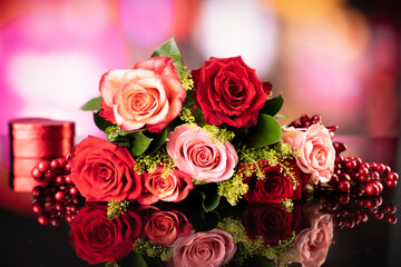 Fototapeta na wymiar Bunch of roses on the bokeh background. Valentines gift. 