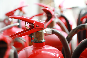 red tank fire extinguisher.