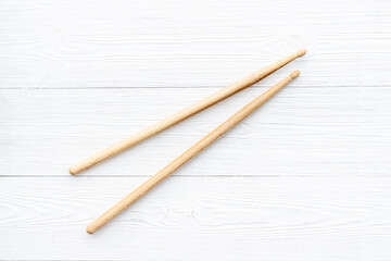 Two wooden drum sticks, top view. Music background