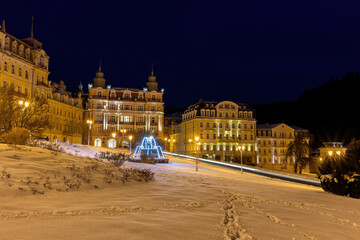 Fototapeta na wymiar Snow winter in the center of small Czech spa town Marianske Lazne (Marienbad) - Czech Republic