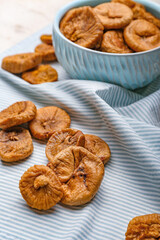 Tasty dried figs on table