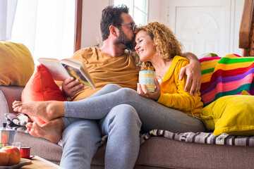 Happy beautiful caucasian couple at home enjoy morning leisure activity in relax together - love...