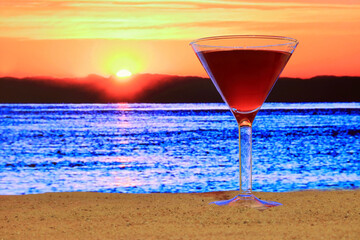 a glass of wine by the sea