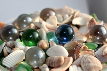 colored crystals on the seashells and the glasses